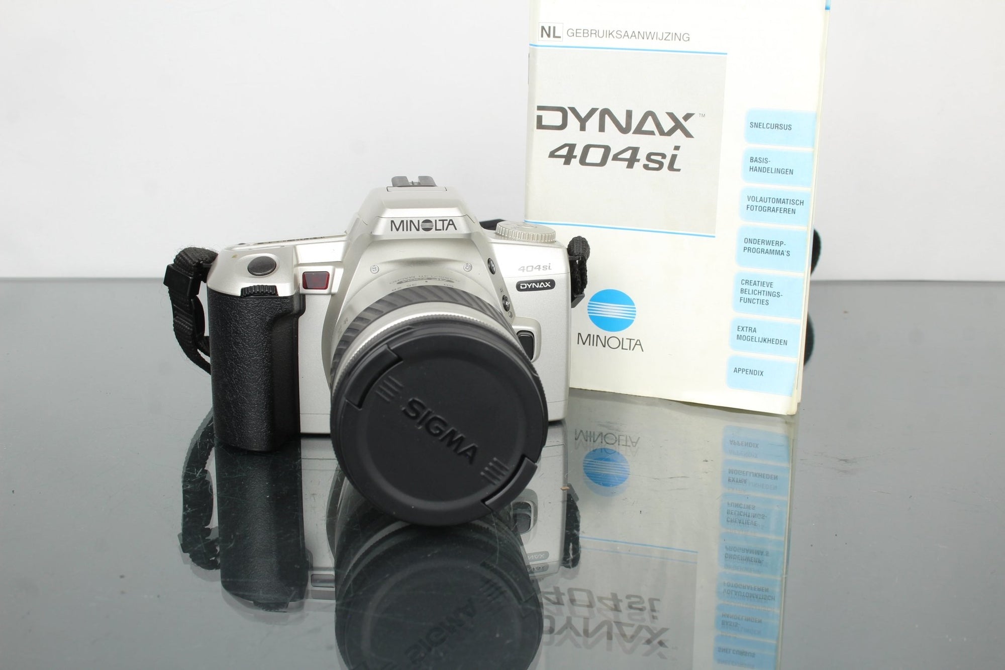 Minolta Dynax 404si + Minolta AF Zoom 28 - 80mm 1:3.5(22) - 5.6 - Dutch|Thrift