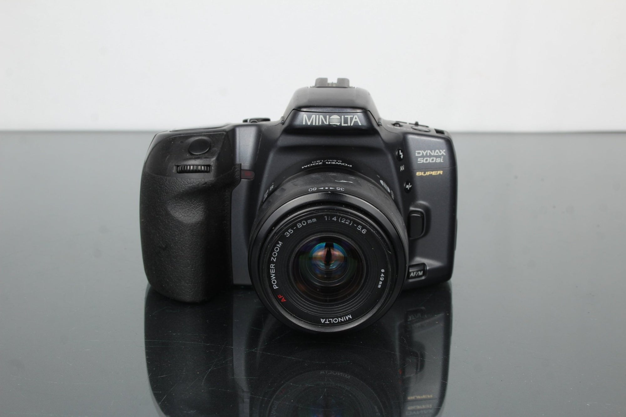 Minolta Dynax 500si Super + AF Power Zoom 35 - 80mm 1:4(22) - 5.6 - Dutch|Thrift