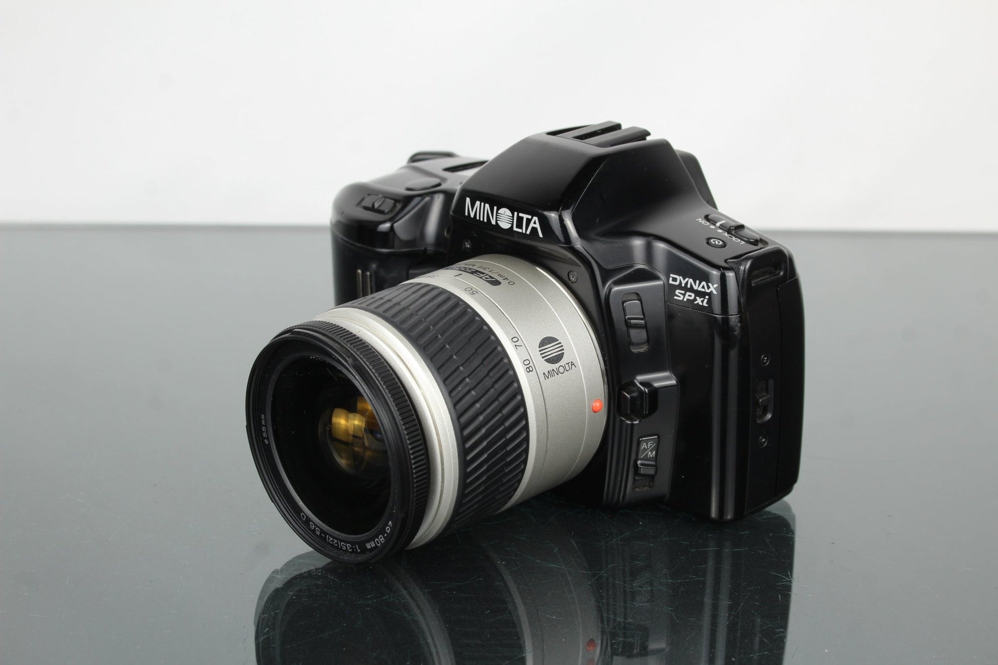 Minolta Dynax SP xi + Minolta AF Zoom 28 - 80mm lens - Dutch|Thrift