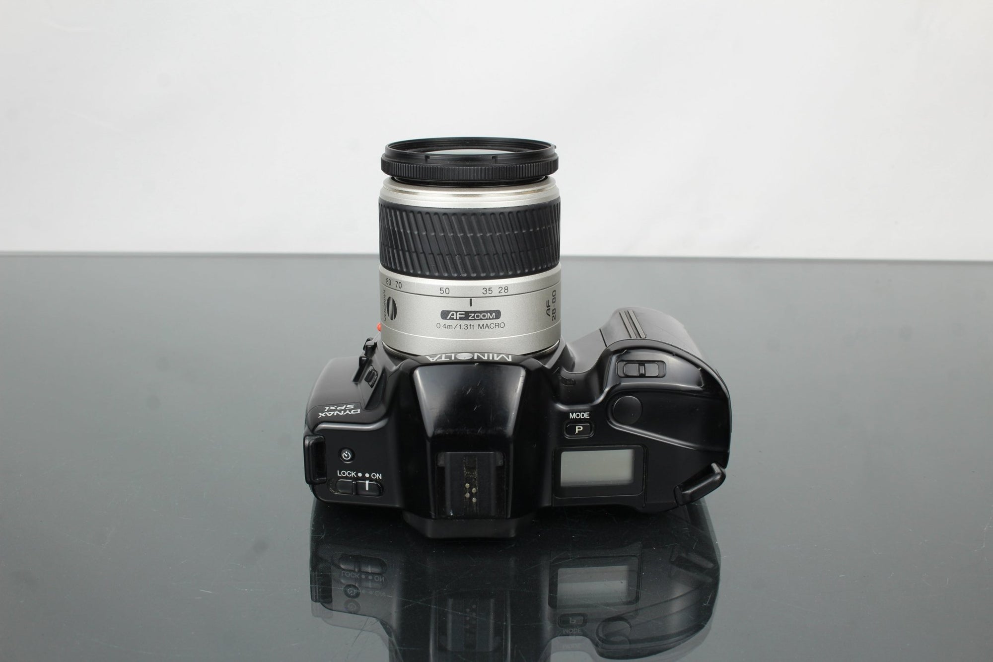 Minolta Dynax SP xi + Minolta AF Zoom 28 - 80mm lens - Dutch|Thrift