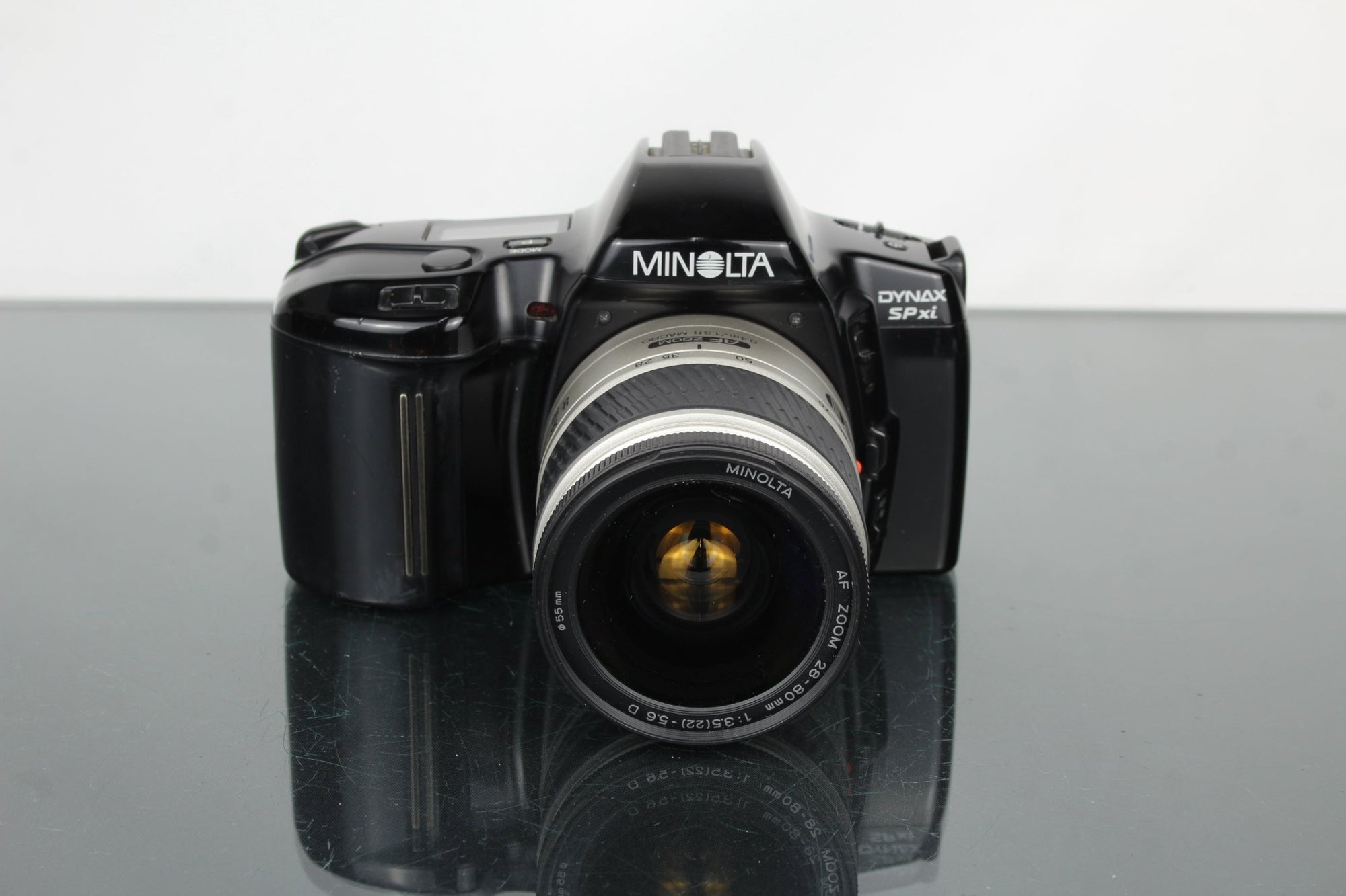 Minolta Dynax SP xi + Minolta AF Zoom 28 - 80mm lens - Dutch|Thrift