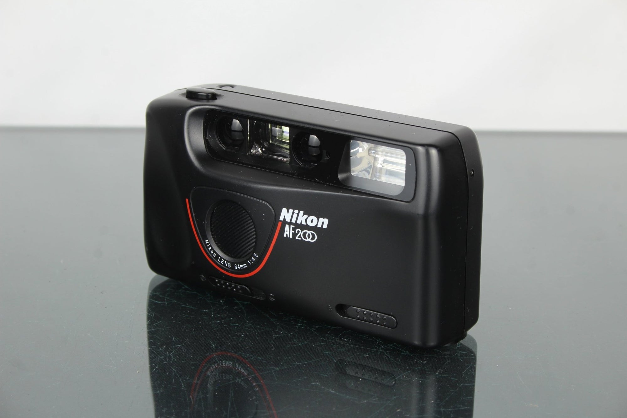 Nikon AF 200 - Dutch|Thrift