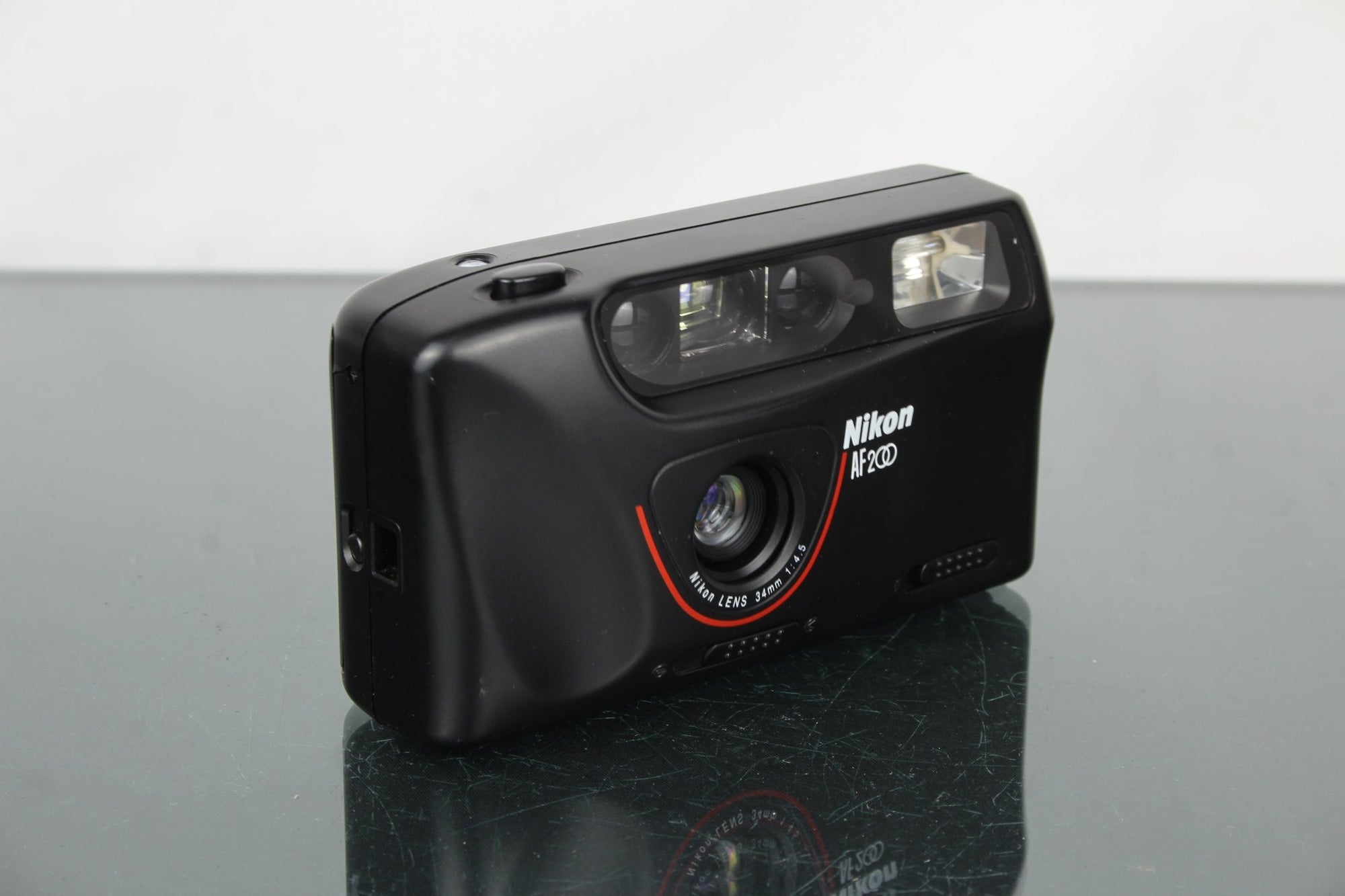 Nikon AF 200 - Dutch|Thrift