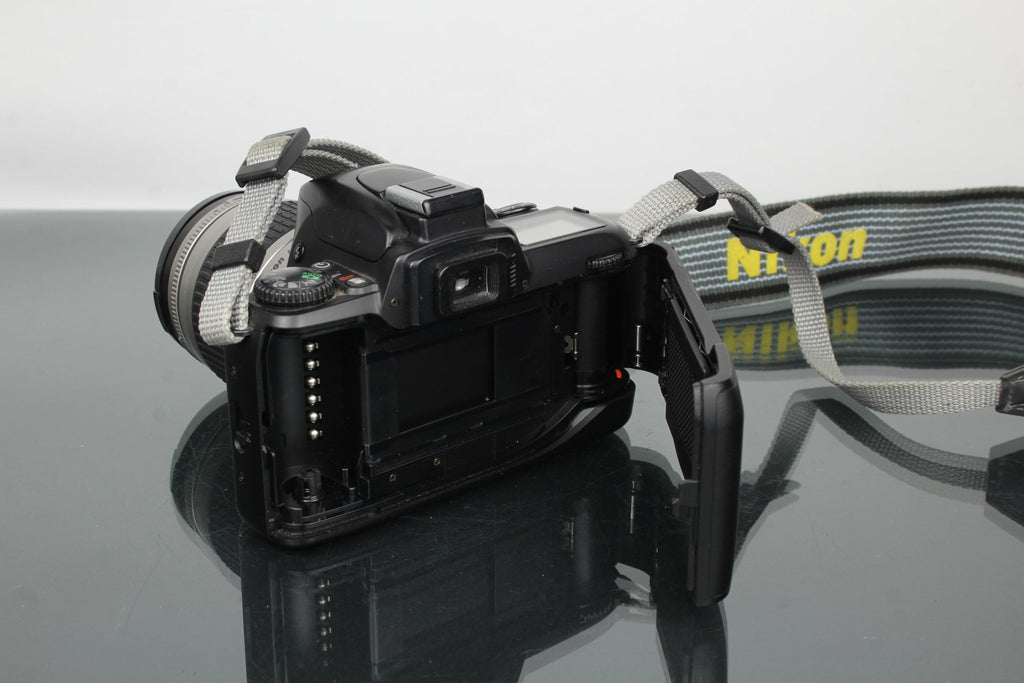 Nikon F65 + AF Nikkor 28 - 80mm 1:3.3 - 5.6 G - Dutch|Thrift