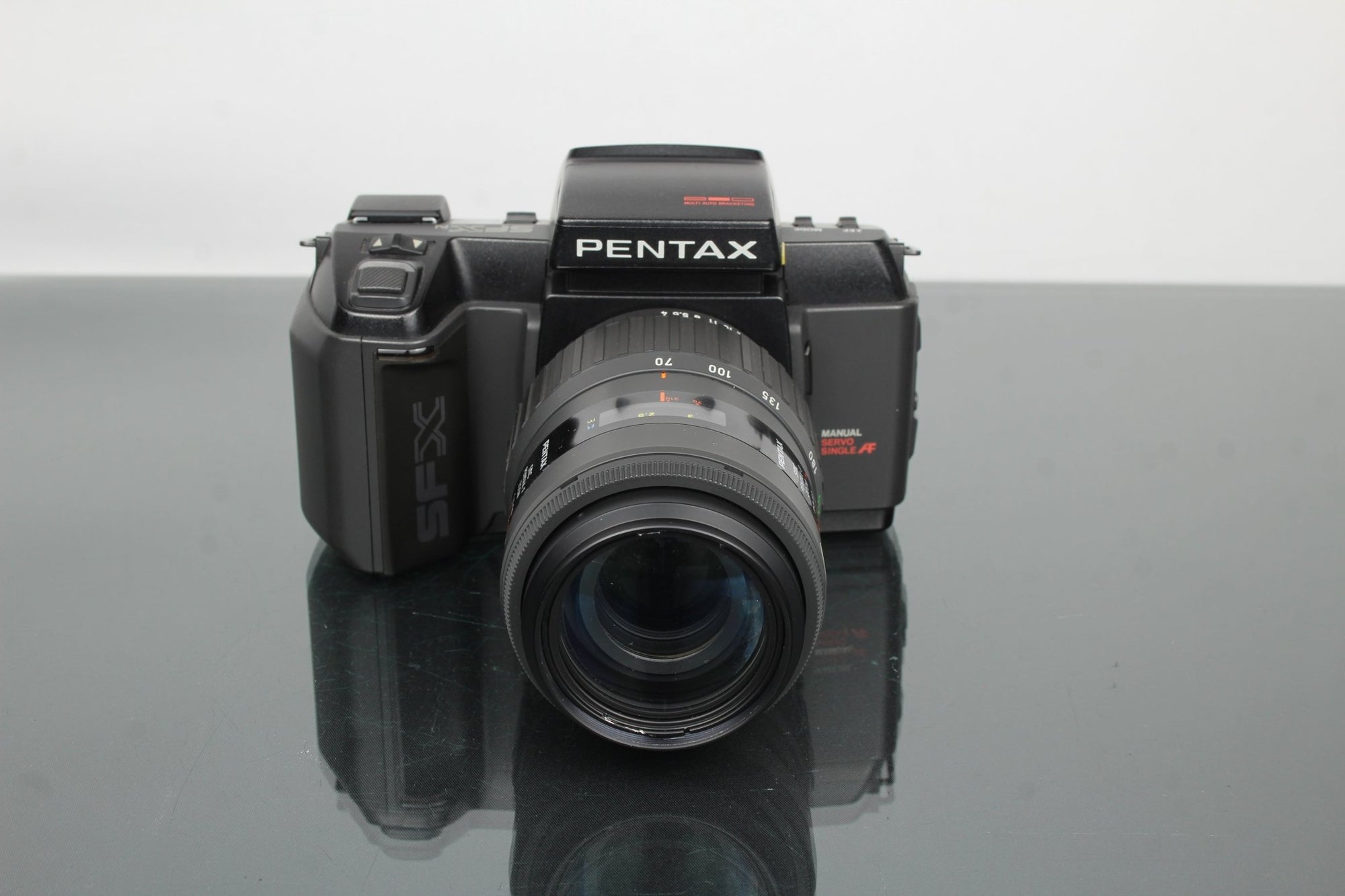 Pentax SFX N + SMC Pentax F Zoom 70 - 210mm f/4 - 5.6 lens - Dutch|Thrift